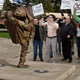 The morons demand a drawdown of troops in Iraq in front of what they believe to be a monument to fallen soldiers.